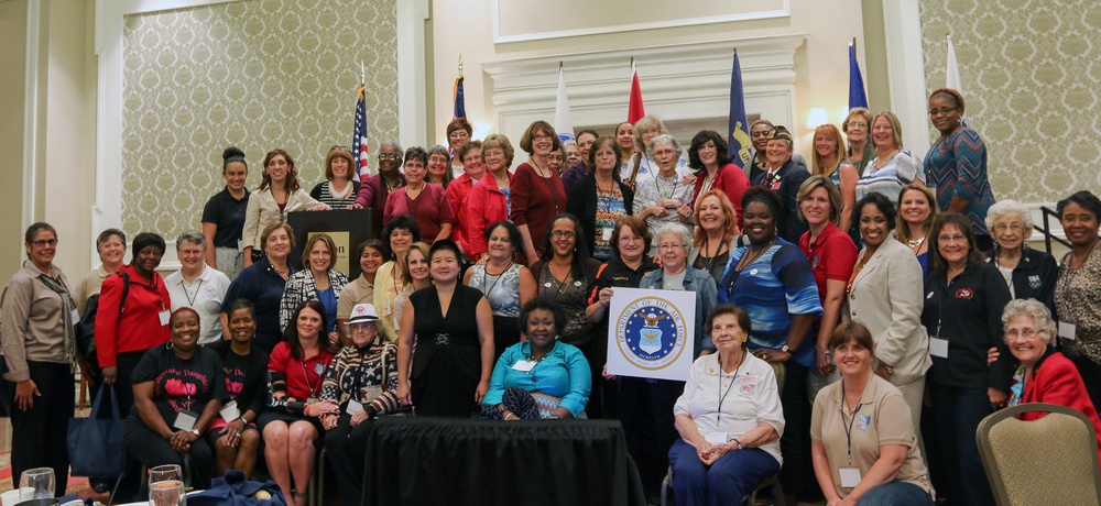 Women veterans gathered together at a community conference
